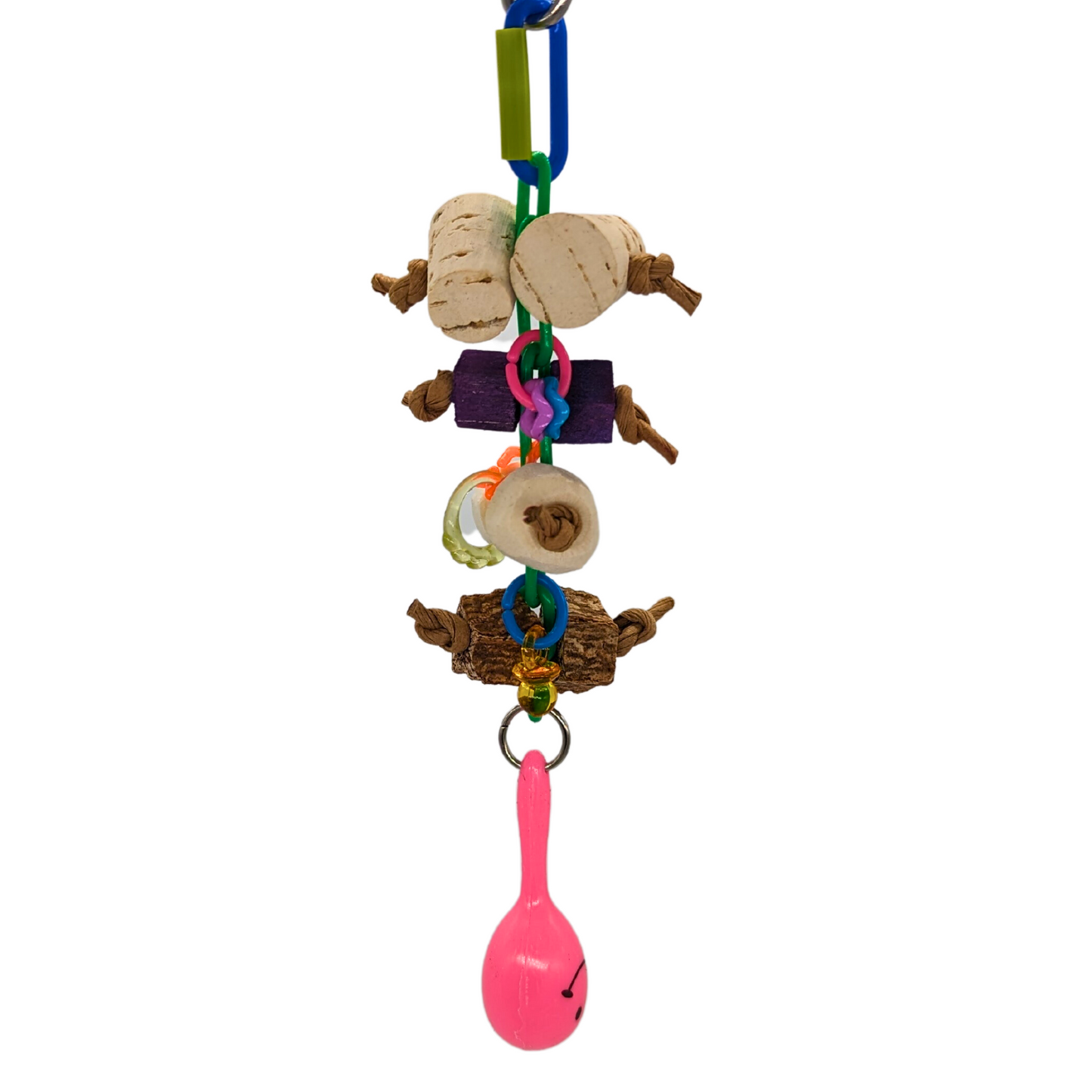 A bird toy with cork, balsa, sola, and mahogany pods, tied onto a plastic chain, and adorned with a maraca and plastic charms.