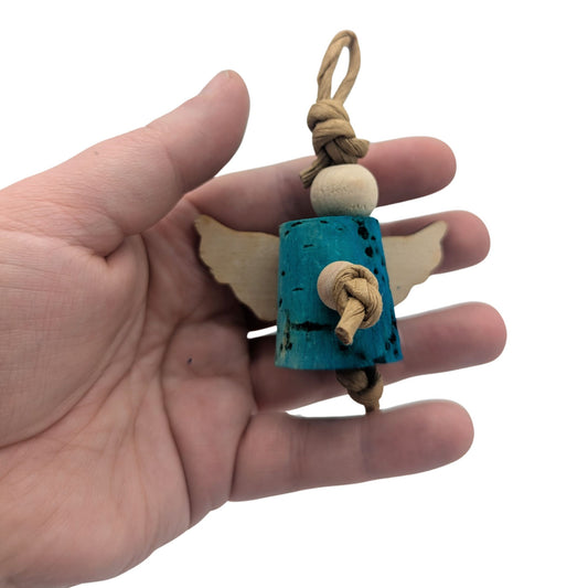 Angel Ornament by Lil Monsters Bird Toys. Held in hand to show scale.