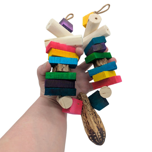 Balsa Garland by Lil Monsters Bird Toys. Held folded in hand for scale.