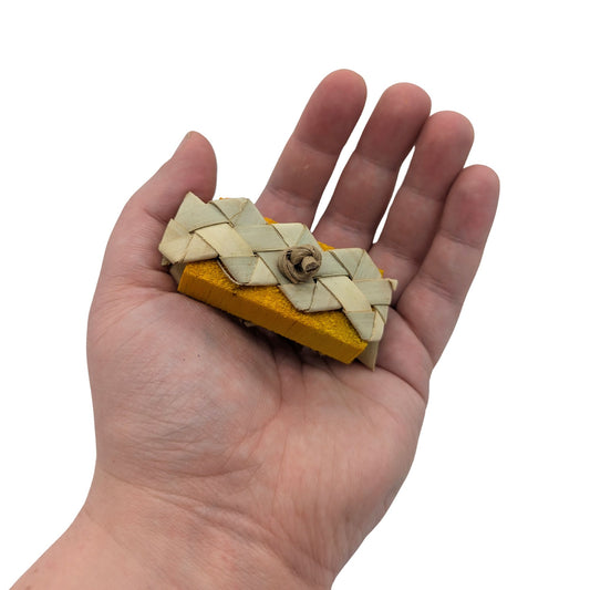 Balsa Sandwich by Lil Monsters Bird Toys. Held in hand for scale.