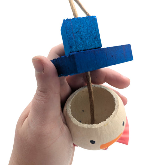 Chilly by Lil Monsters Bird Toys. Detail photo showing the hat removed with a spot inside the head to hide treats.