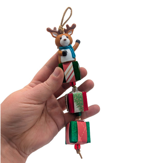 Santa's Helper by Lil Monsters Bird Toys. Held in hand to show scale.