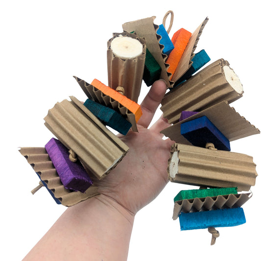Tapioca by Lil Monsters Bird Toys. Held in hand for scale.