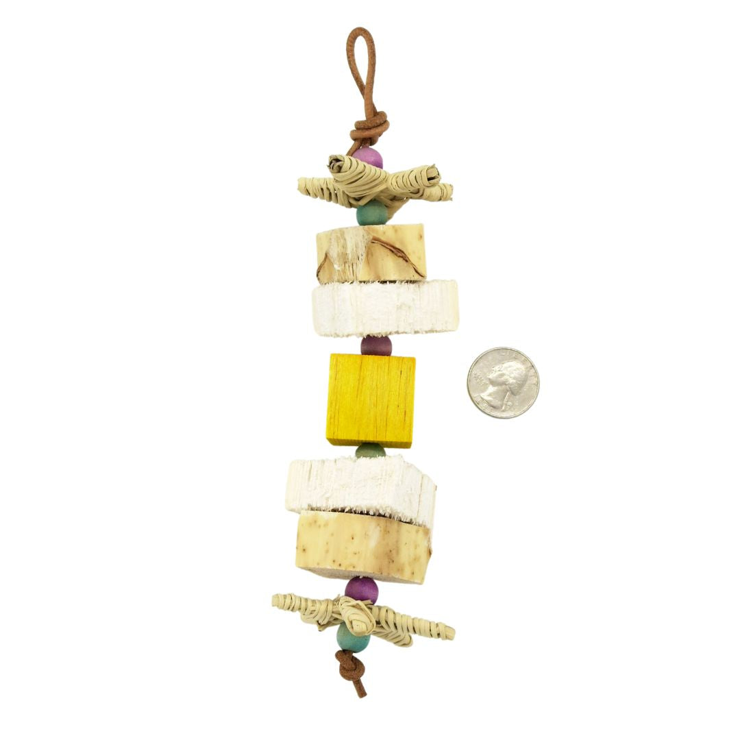 Two vine stars, with 2 sets of yucca with the soft flesh exposed, and a central balsa block. With paper rope and wood beads.