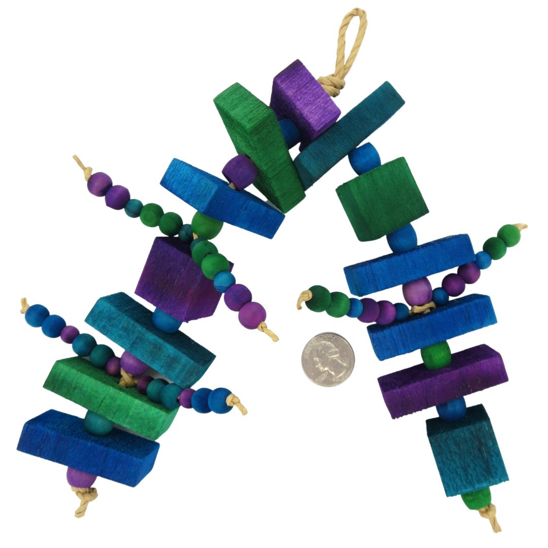 A toy with 10 half inch thick balsa slats, 3 one inch balsa blocks, and 3 sets of wooden beads. Shown with US quarter for scale