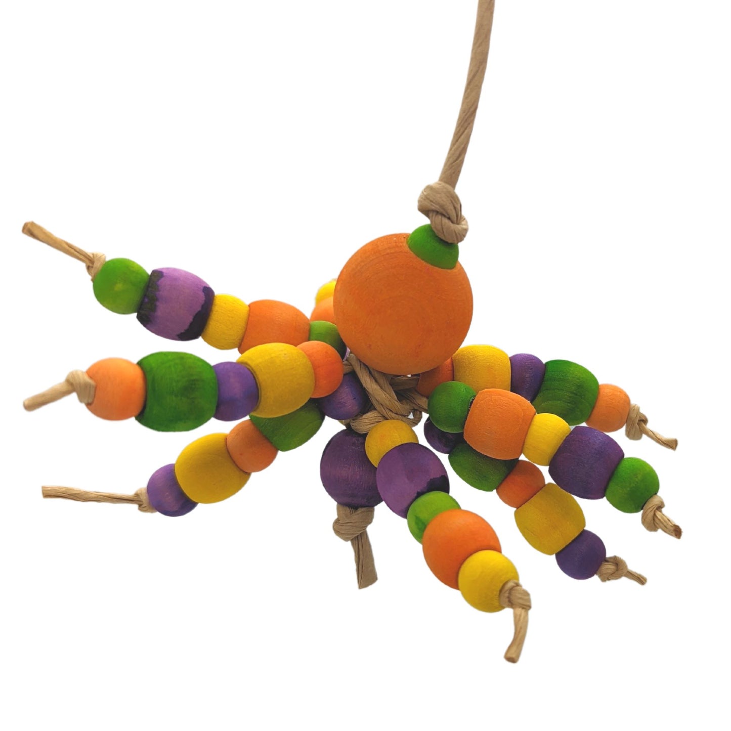 A colorful beaded spider-inspired parrot toy made with wooden beads in various sizes and strung on paper rope.