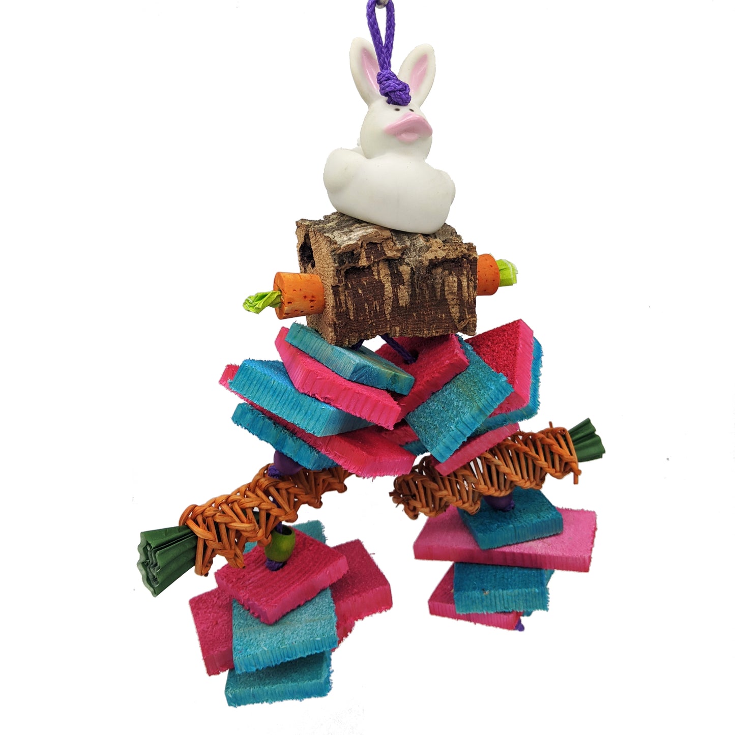 A vinyl rubber bunny sits on top of virgin cork bark, with cork stopper carrots. Includes thin and thick natural, kiln-dried pine slices and vine carrots. Great toy for small or medium birds and parrots, including conures, pionus, amazons, senegals, and more.