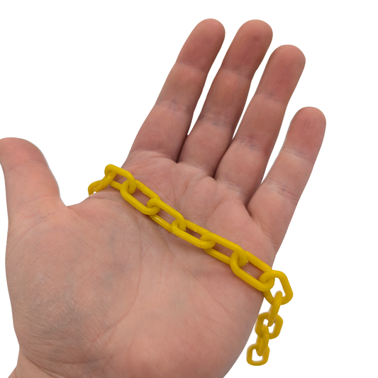 3mm Yellow Plastic Chain bird toy part, in hand for scale