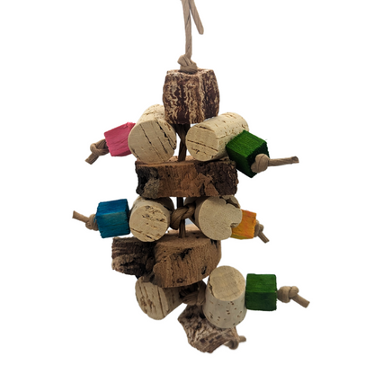 Corky parrot toy by Lil Monsters Bird Toys, with cork stoppers, cork bark, balsa, and mahogany pods