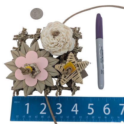 Floral Chic bird toy by Lil Monsters Bird Toys next to a sharpie, ruler, and US quarter for scale