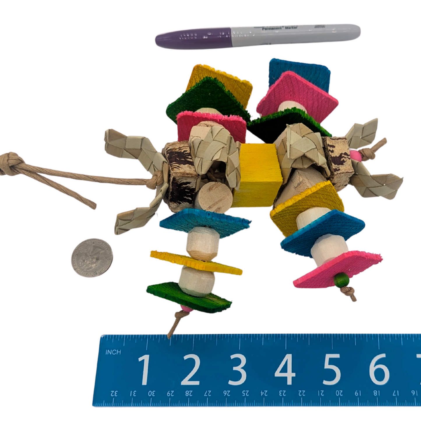 Hodgepodge Lite by Lil Monsters Bird Toys. Shown next to a ruler, US quarter, and sharpie marker for scale.