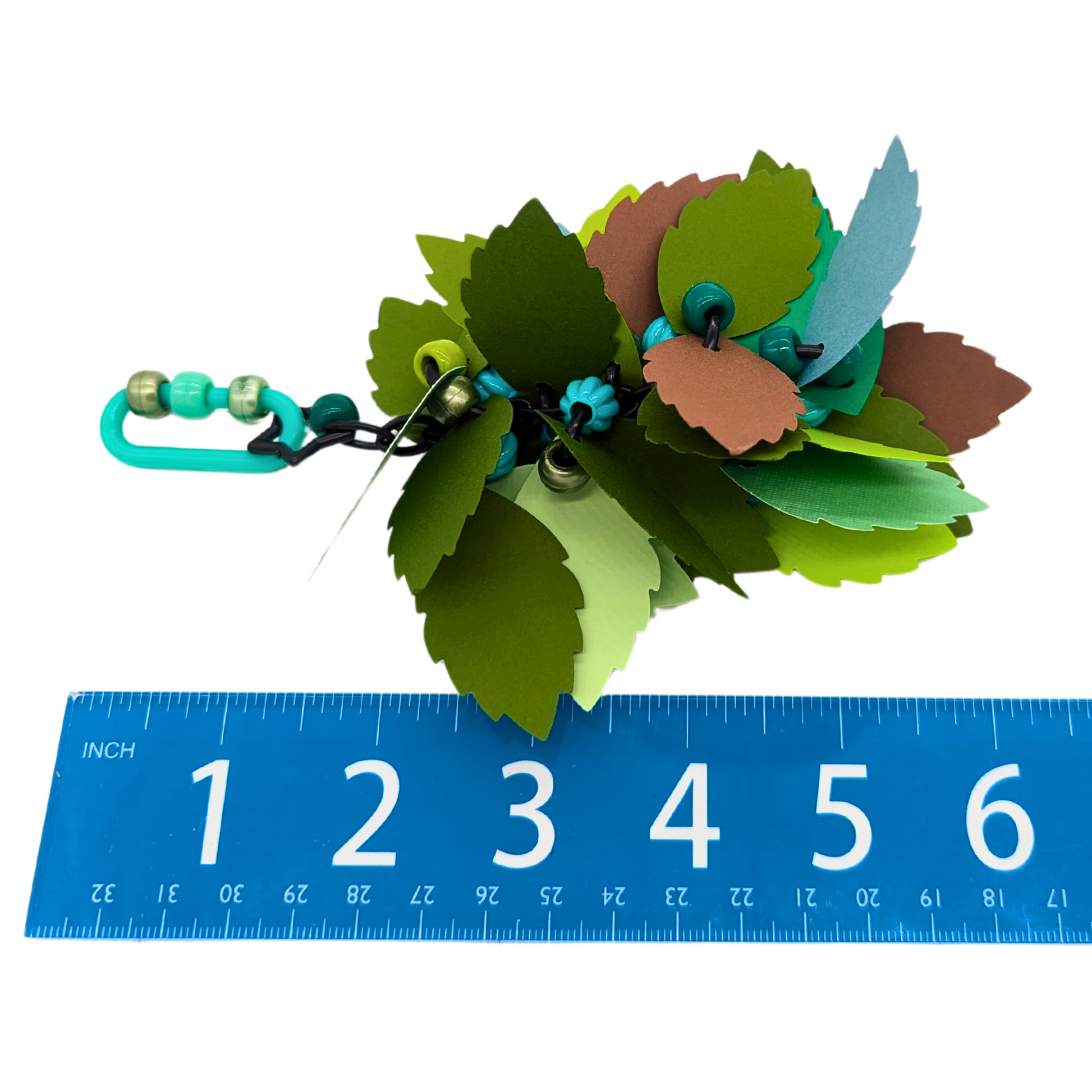Leaves parrot toy by Tiny Conure Trinkets, next to a ruler for scale