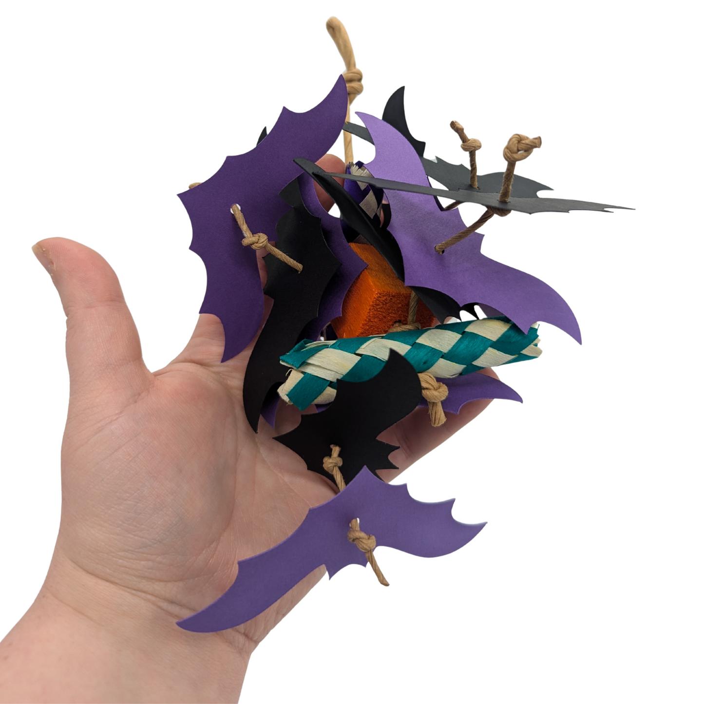 Mini Belfry Halloween Parrot Toy by Lil Monsters Bird Toys, held in hand for scale