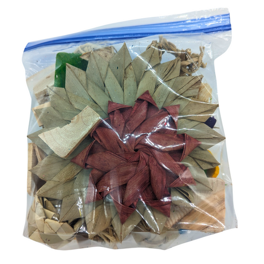 A bag of natural shred scraps, which could include palm, vine, seagrass, and more. By Lil Monsters Bird Toys