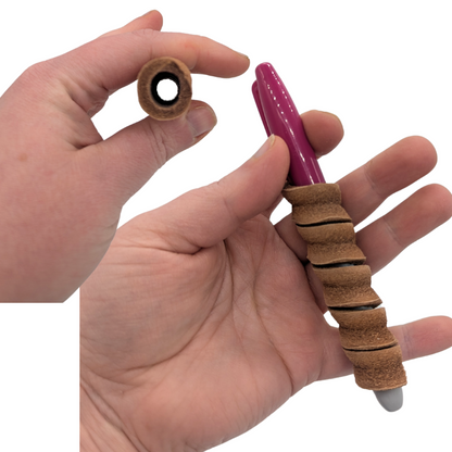 Rotini foot toy by Lil Monsters Bird Toys,  showcasing the hole through the middle that will wrap around an object such as a thin marker