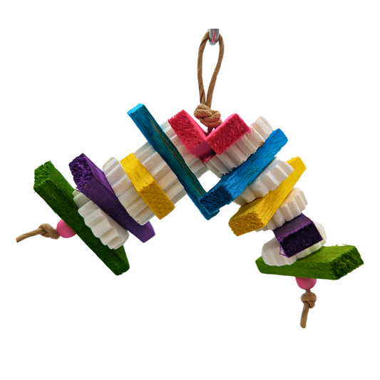 Teensy, a small bird toy made with colorful balsa slats and separated by sola discs, by Lil Monsters Bird Toys