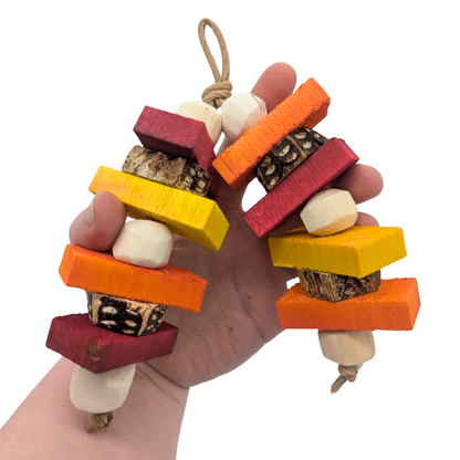 Antic by Lil Monsters Bird Toys. Held in hand for scale. 