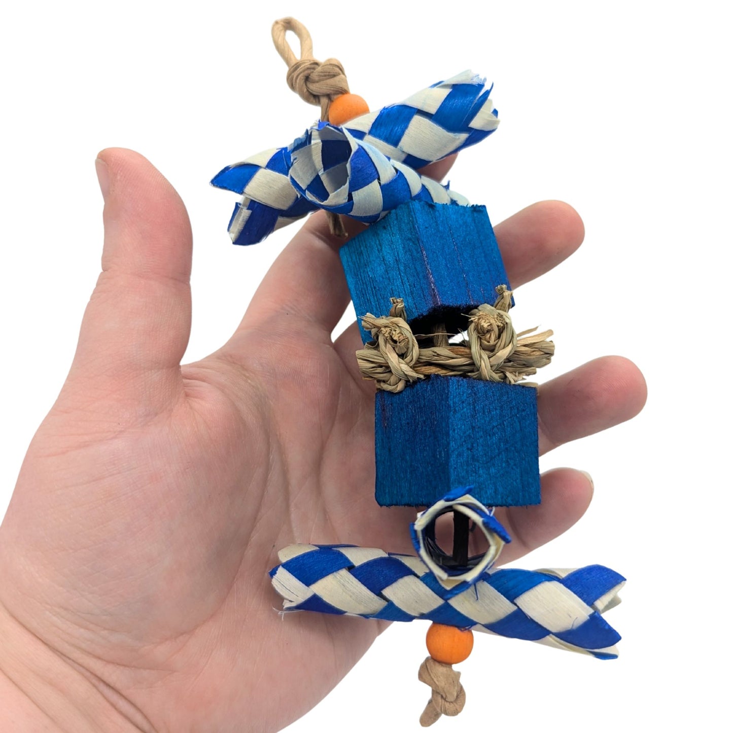 Argyle by Lil Monsters Bird Toys. Held in hand for scale. Blue coloration.