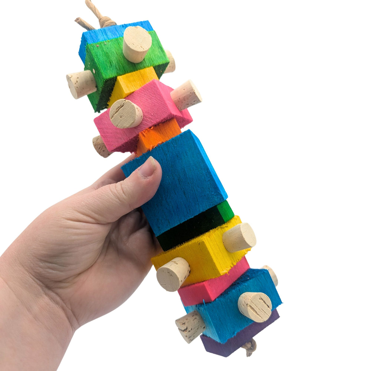 Balsa Spire by Lil Monsters Bird Toys. Held in hand to show scale. 