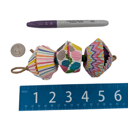 Balsa Surprise by Lil Monsters Bird Toys. Shown next to a US quarter, Sharpie marker, and ruler for scale. 