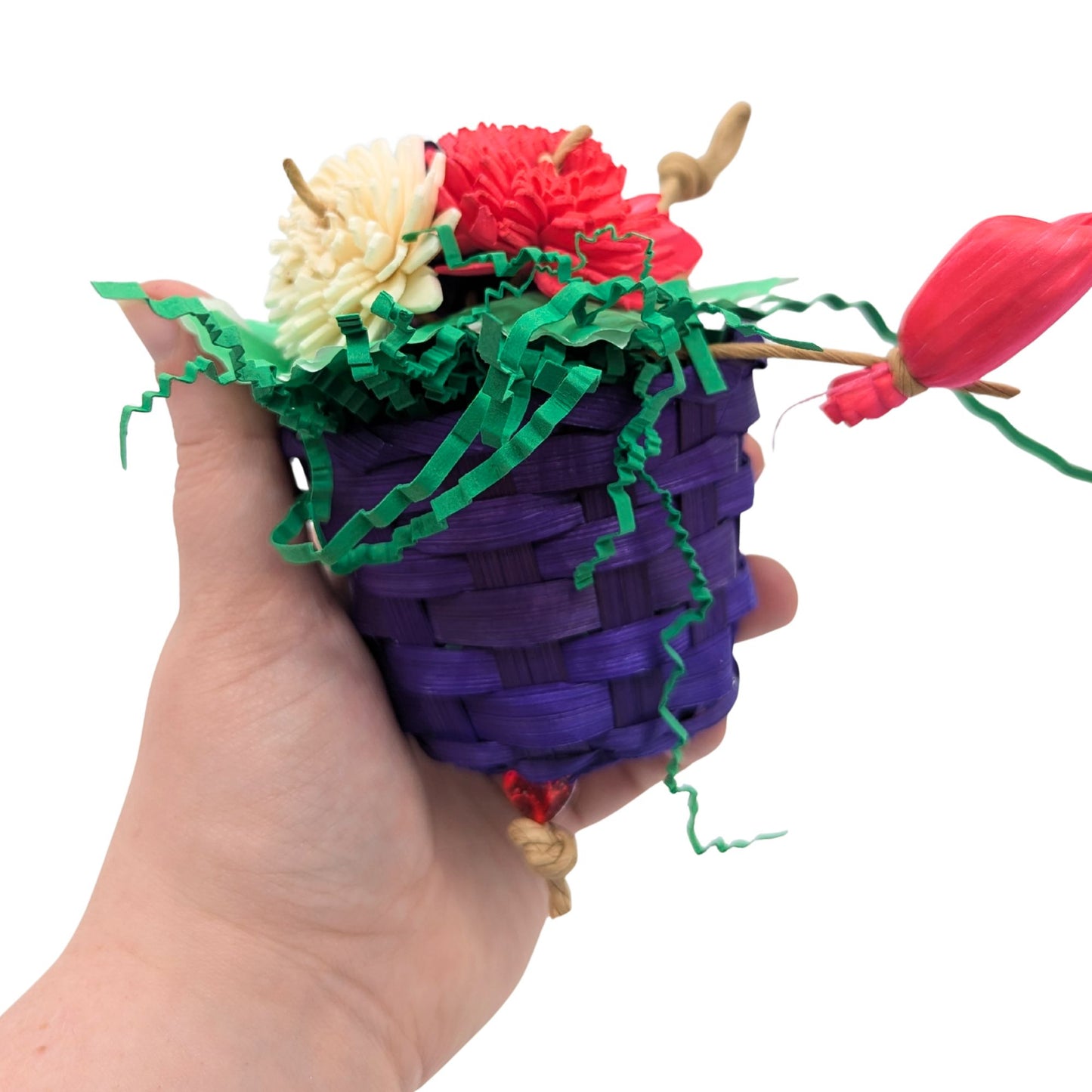 Basket Bunch by Lil Monsters Bird Toys.  Shown in hand in profile view for scale. 