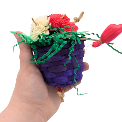 Basket Bunch by Lil Monsters Bird Toys.  Shown in hand in profile view for scale. 