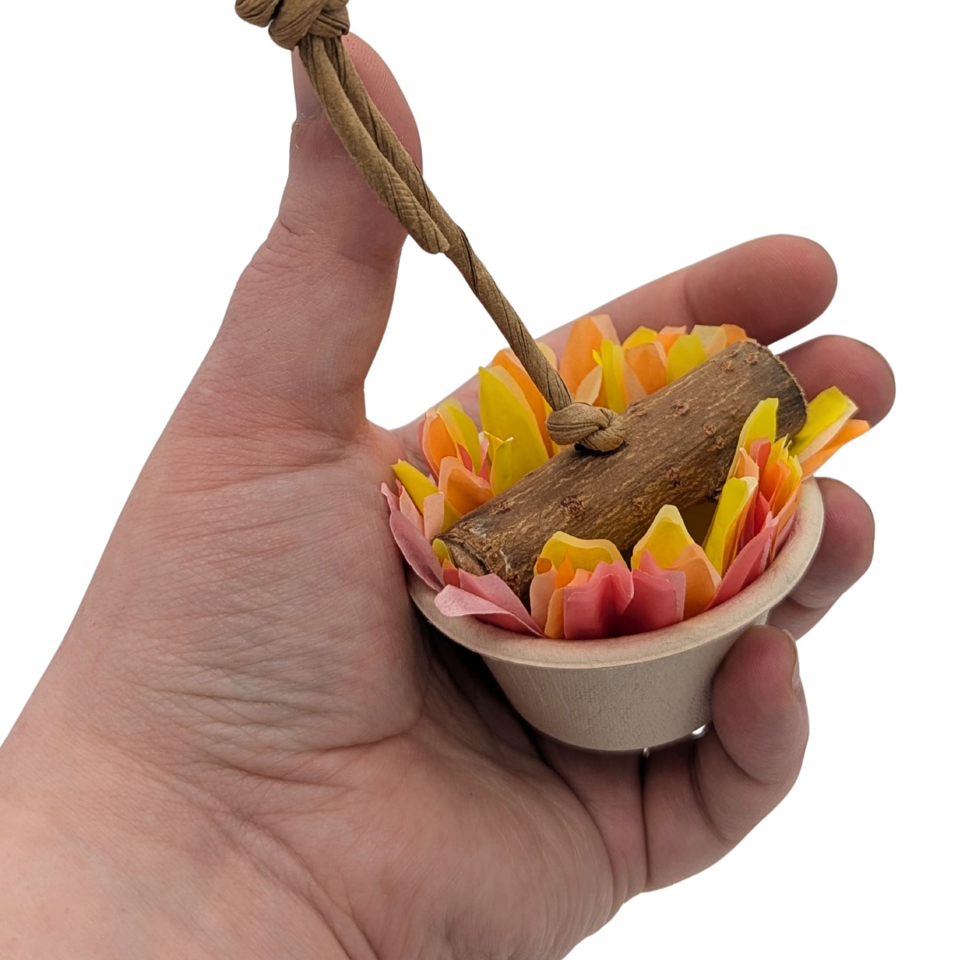 Brazier by Lil Monsters Bird Toys. Hanging option, shown in hand for scale. 