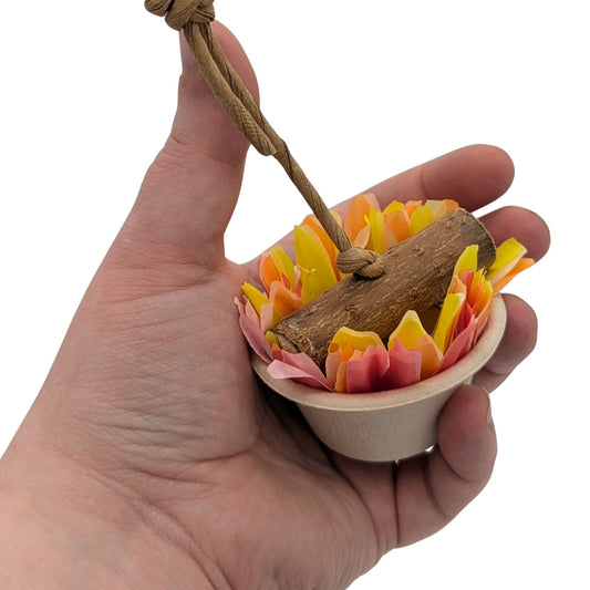 Brazier by Lil Monsters Bird Toys. Hanging option, shown in hand for scale. 