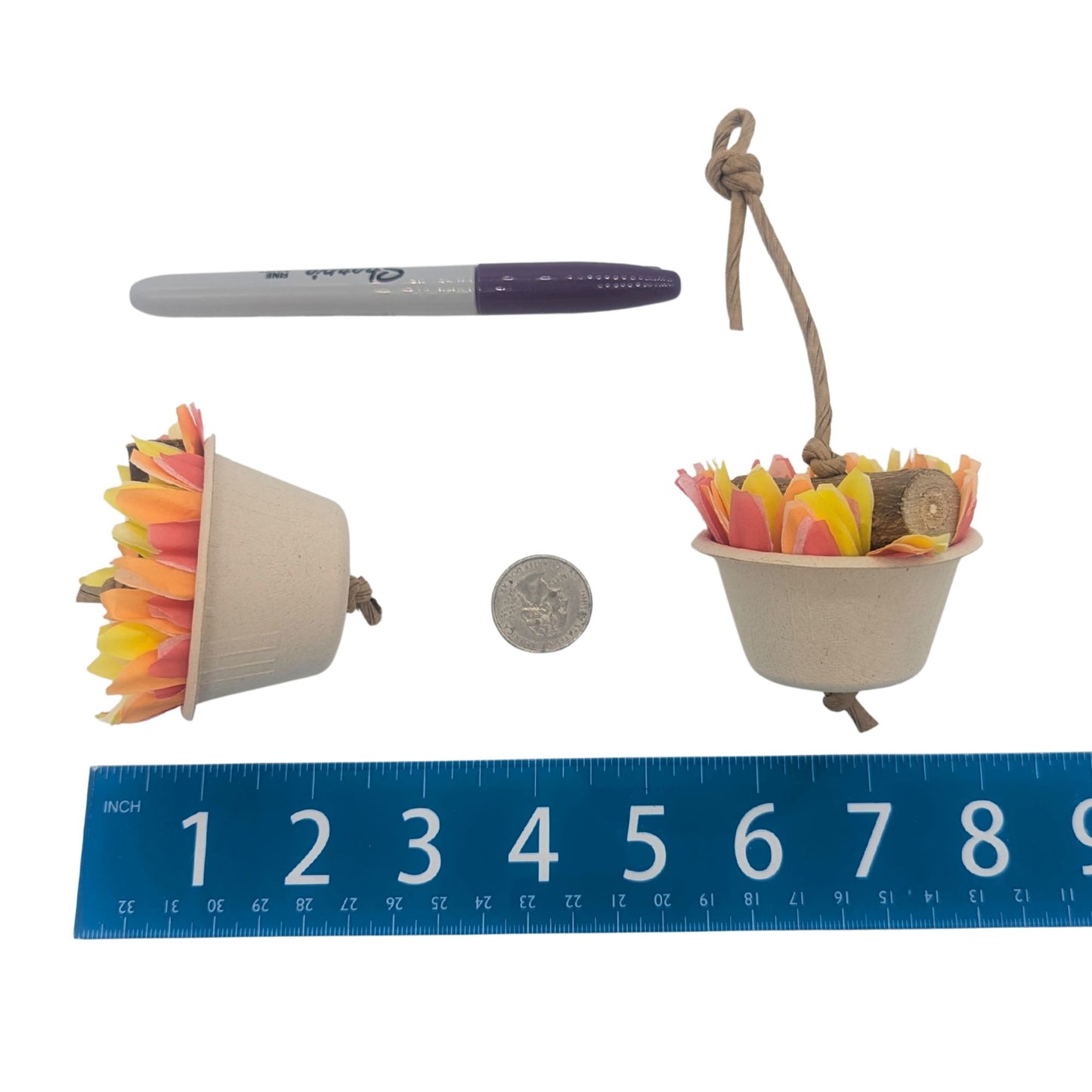 Brazier by Lil Monsters Bird Toys. Hanging and Foot Toy options shown next to a US quarter, Sharpie marker, and ruler for scale and comparison. 