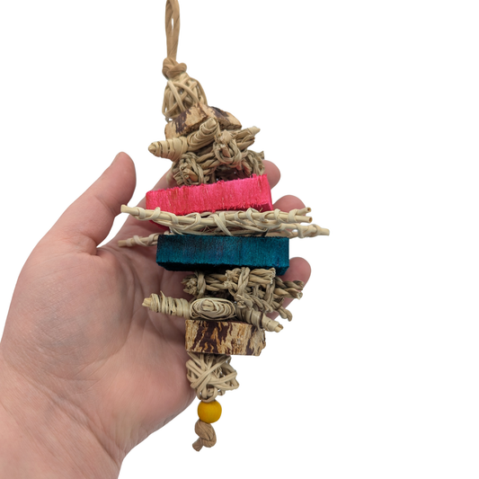 Briar by Lil Monsters Bird Toys. Held in hand for scale. 