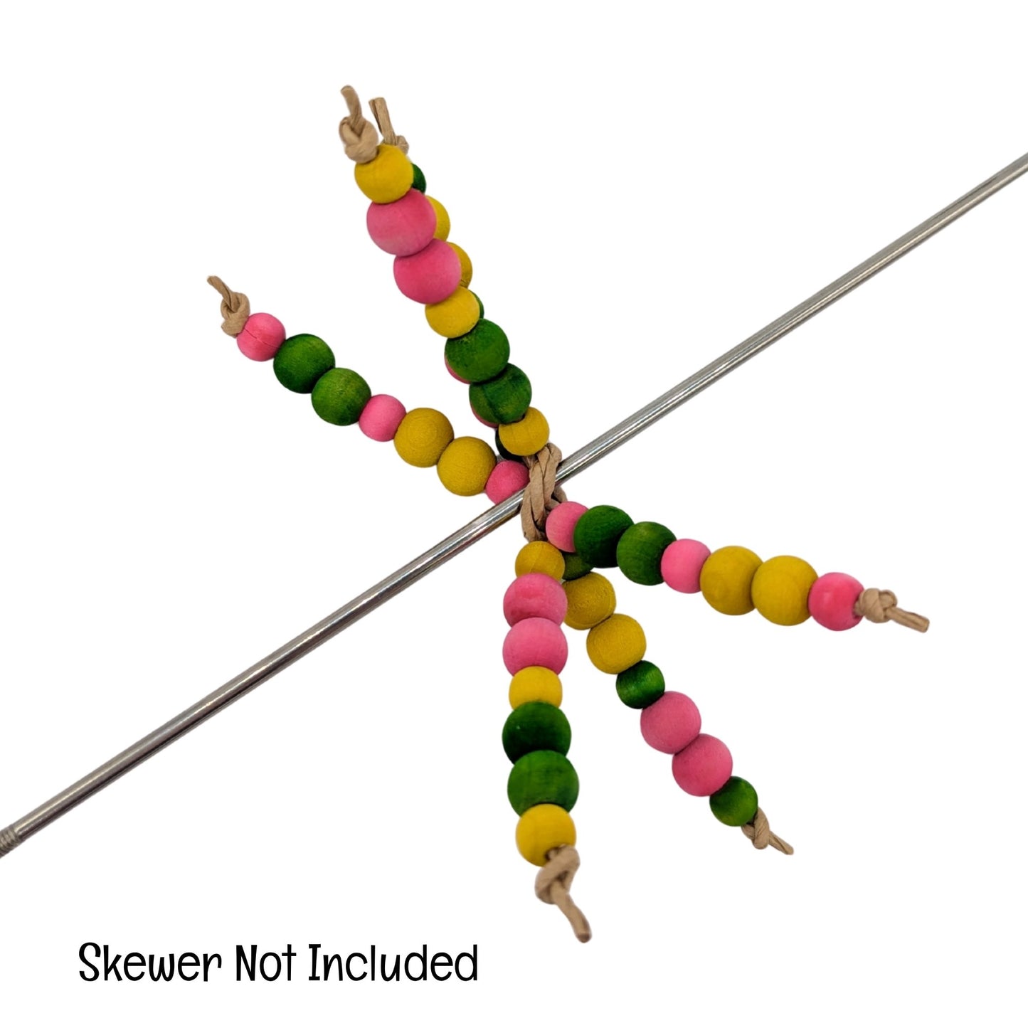 Bunch o' Peas by Lil Monsters Bird Toys. Shown on a skewer to demonstrate use. Text overlay says "Skewer Not Included"