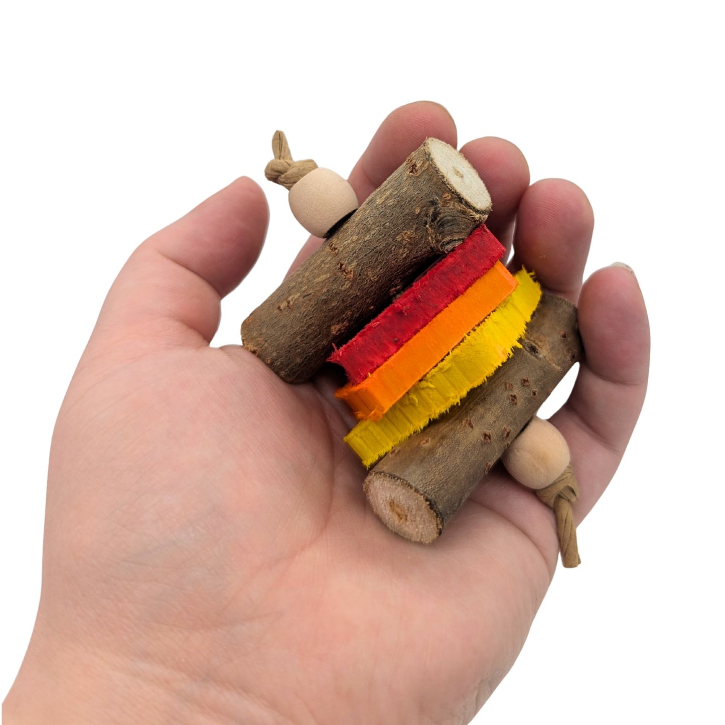 Cinder by Lil Monsters Bird Toys. Held in hand for scale. 