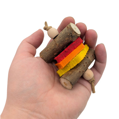 Cinder by Lil Monsters Bird Toys. Held in hand for scale. 