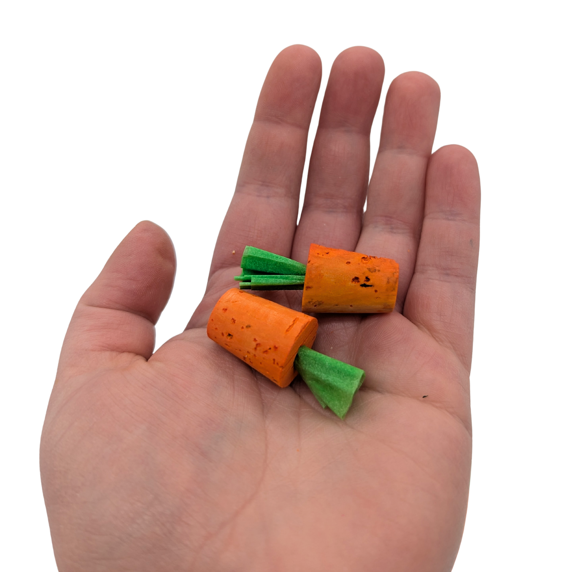 Cork Carrot Refills bird toy by Lil Monsters Bird Toys held in hand for scale