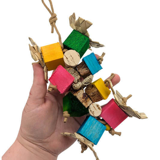 Easy Peasy by Lil Monsters Bird Toys. Held in hand for scale. 