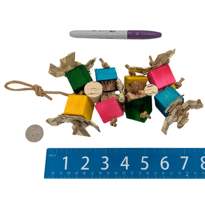 Easy Peasy by Lil Monsters Bird Toys. Shown next to a US quarter, Sharpie marker, and ruler for scale. 