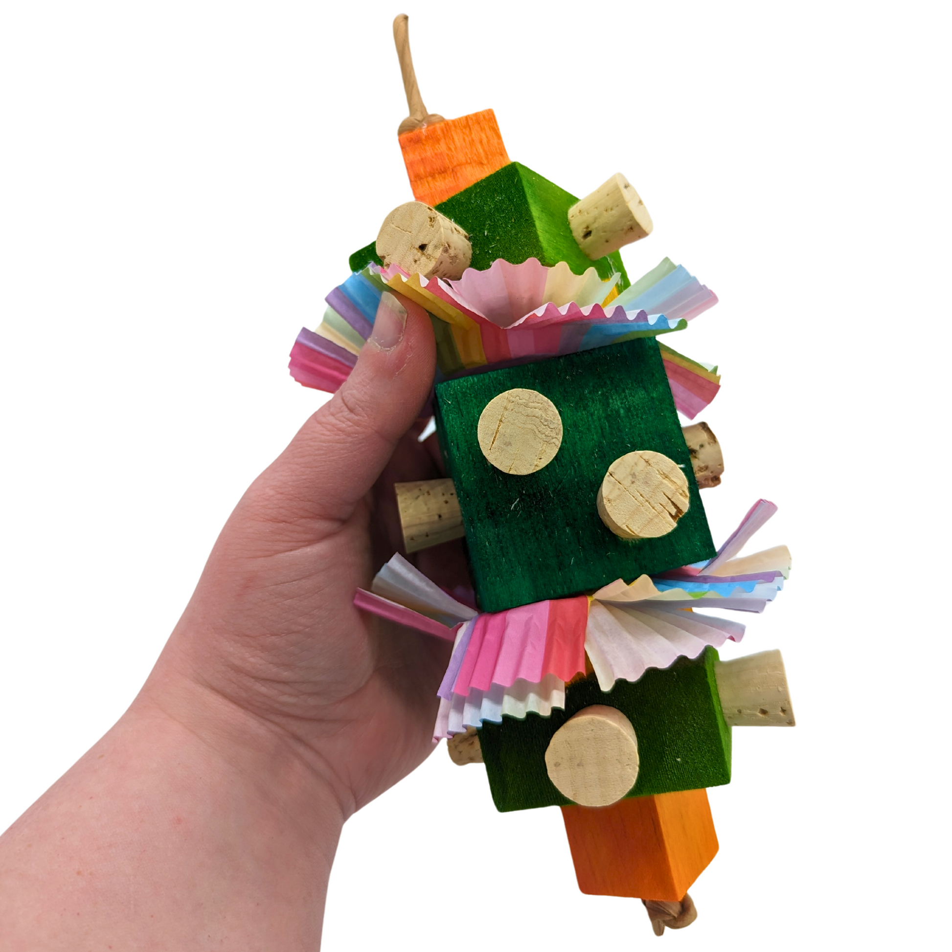 Finnegan St Patrick's Day themed bird toy by Lil Monsters Bird Toys, held in hand for scale