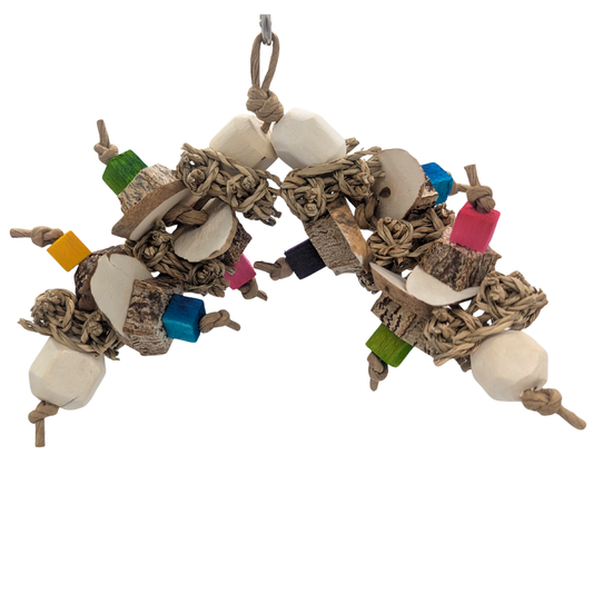 Frolic parrot toy by Lil Monsters Bird Toys, with sola, seagrass, balsa, and mahogany pods. 