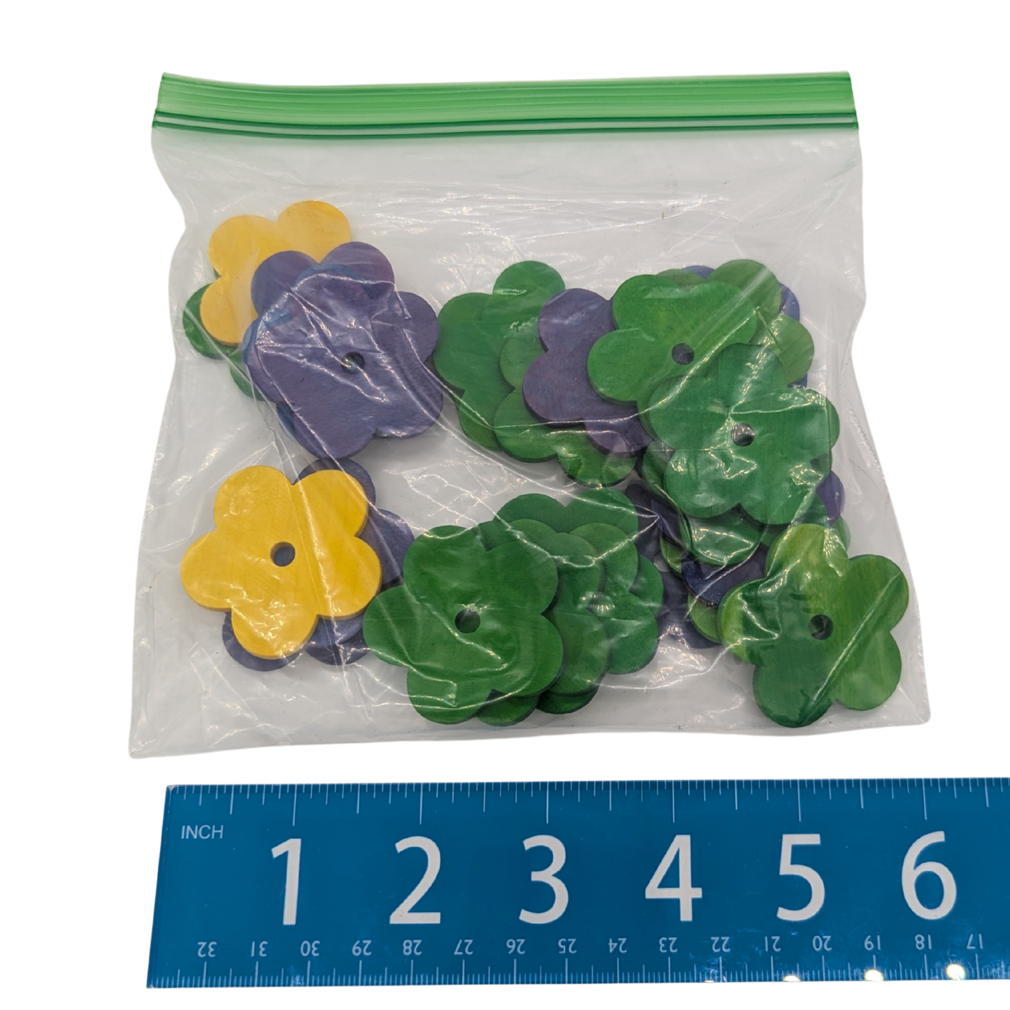 Hardwood Flowers by Lil Monsters Bird Toys, shown next to ruler for scale (bag)