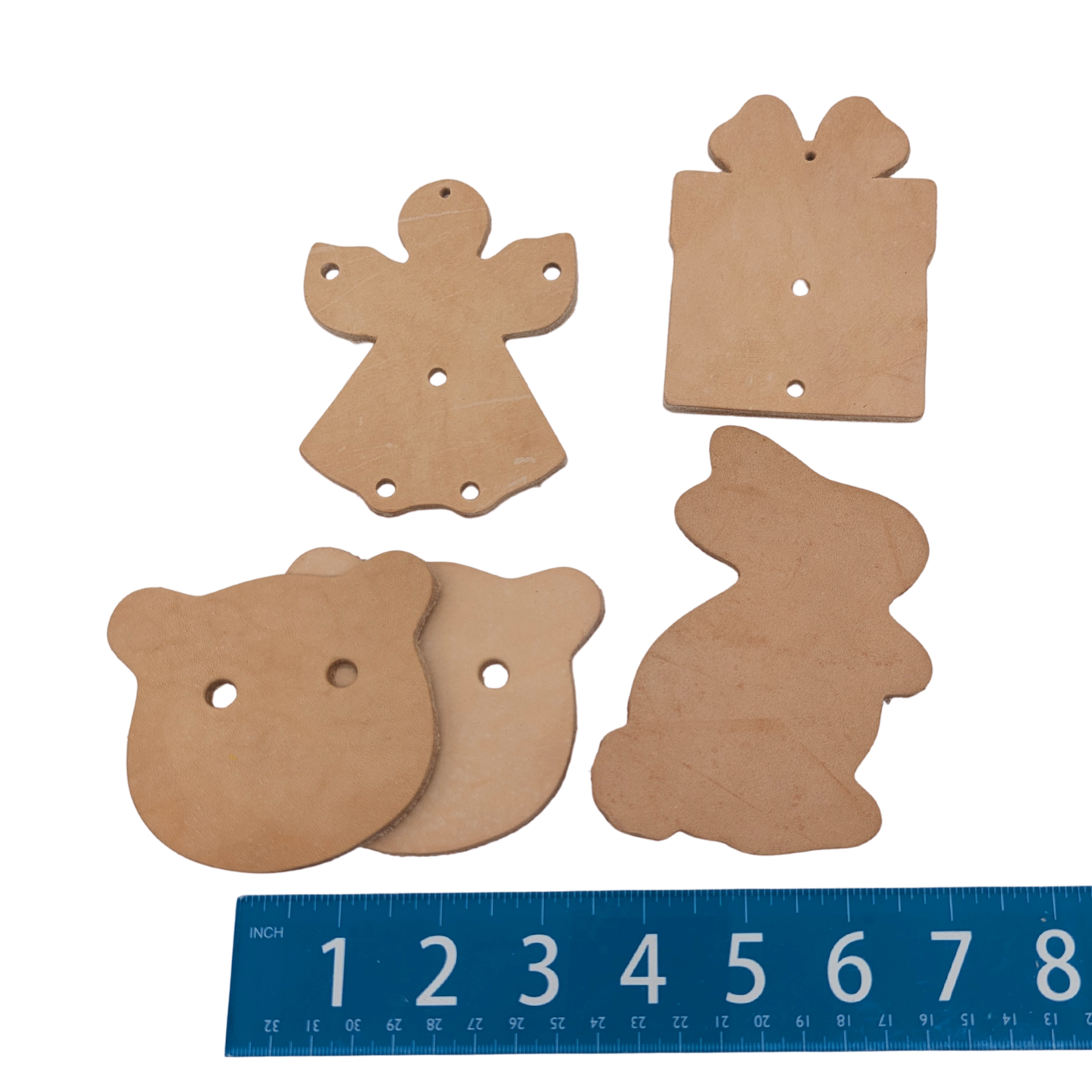 Leather Holiday Shapes (Pack of 5) by Lil Monsters Bird Toys, next to ruler for scale
