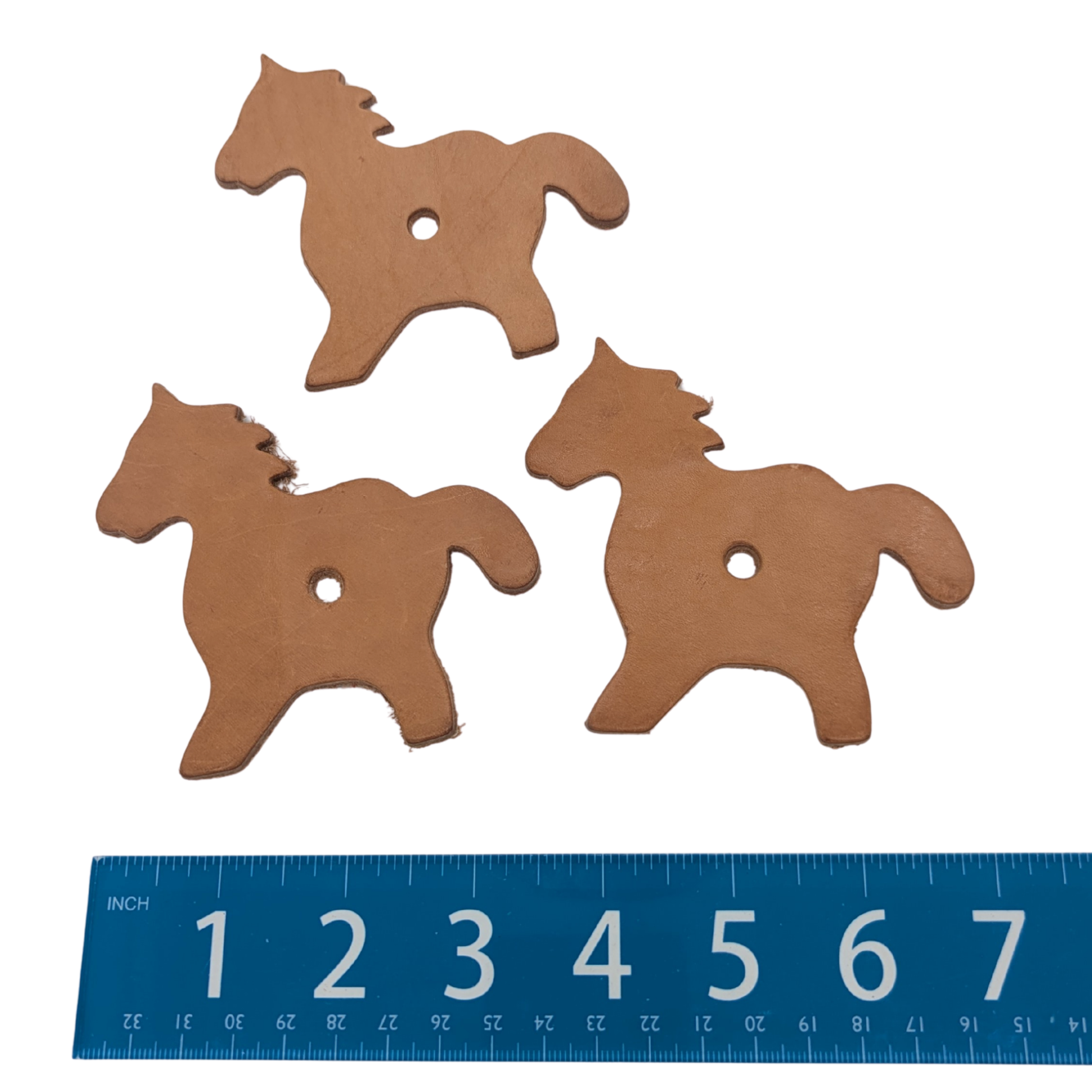 Leather Horse Shapes (Pack of 3) by Lil Monsters Bird Toys, next to ruler for scale