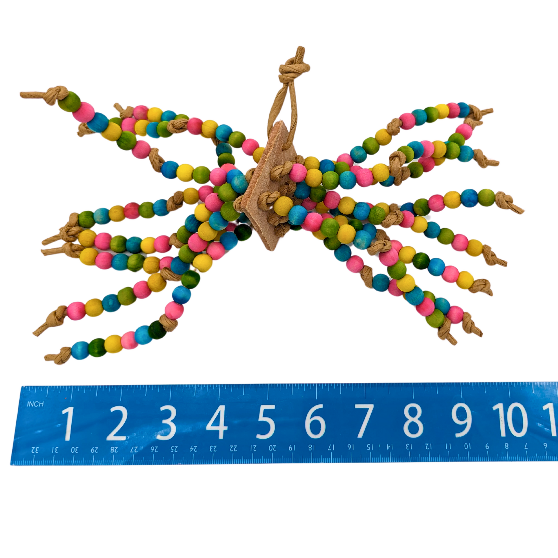 Medusa parrot toy by Lil Monsters Bird Toys, shown next to ruler for scale