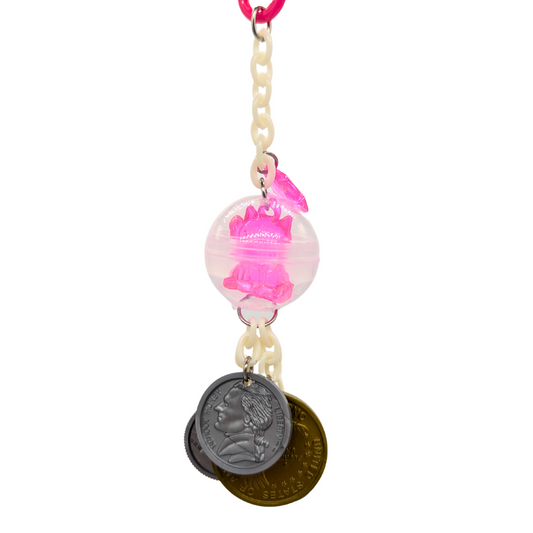 A Maneki Neko bird toy by Tiny Conure Trinkets, with plastic chain, coins, and money cat charm