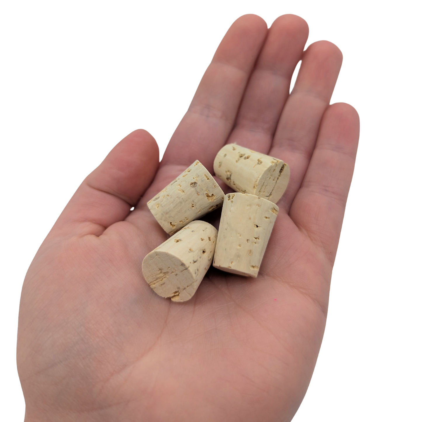 Natural Cork Stoppers (10 pack) by Lil Monsters Bird Toys in hand for scale