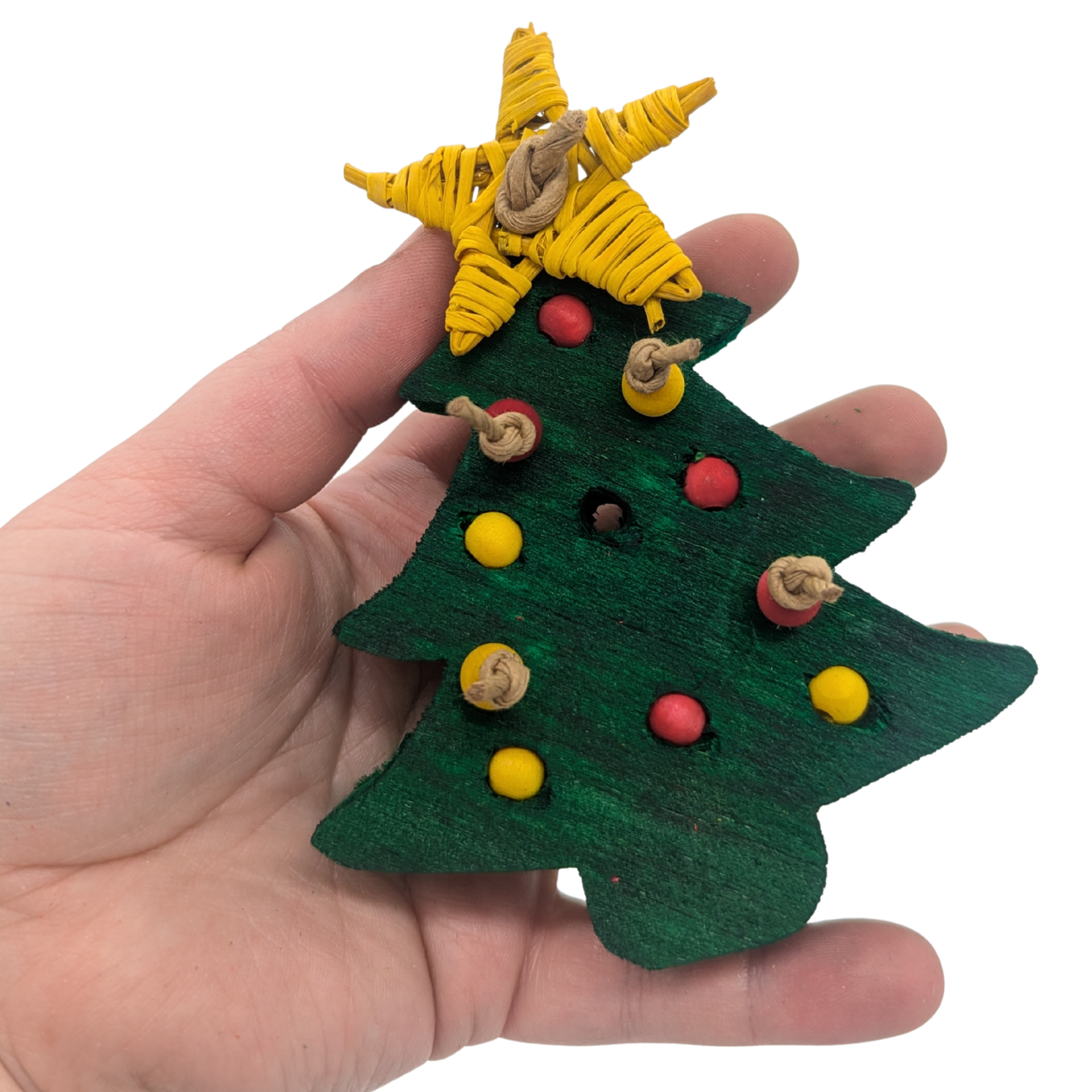 O Christmas Tree (Plastic Free) by Lil Monsters Bird Toys, held in hand for scale
