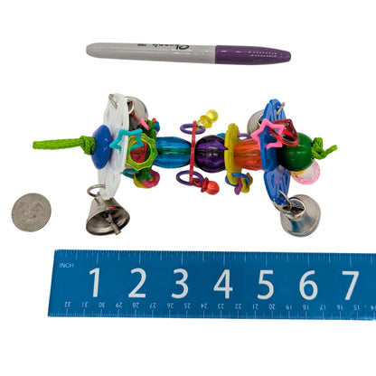 Shimmy by Lil Monsters Bird Toys. Shown next to a US quarter, Sharpie marker, and ruler for scale.