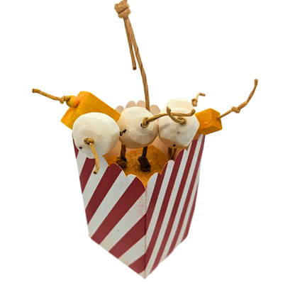 Snack Attack popcorn themed parrot toy by Lil Monsters Bird Toys, with balsa, sola, and cardboard snack box