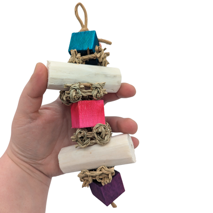 Solafrass by Lil Monsters Bird Toys. Held in hand for scale. 
