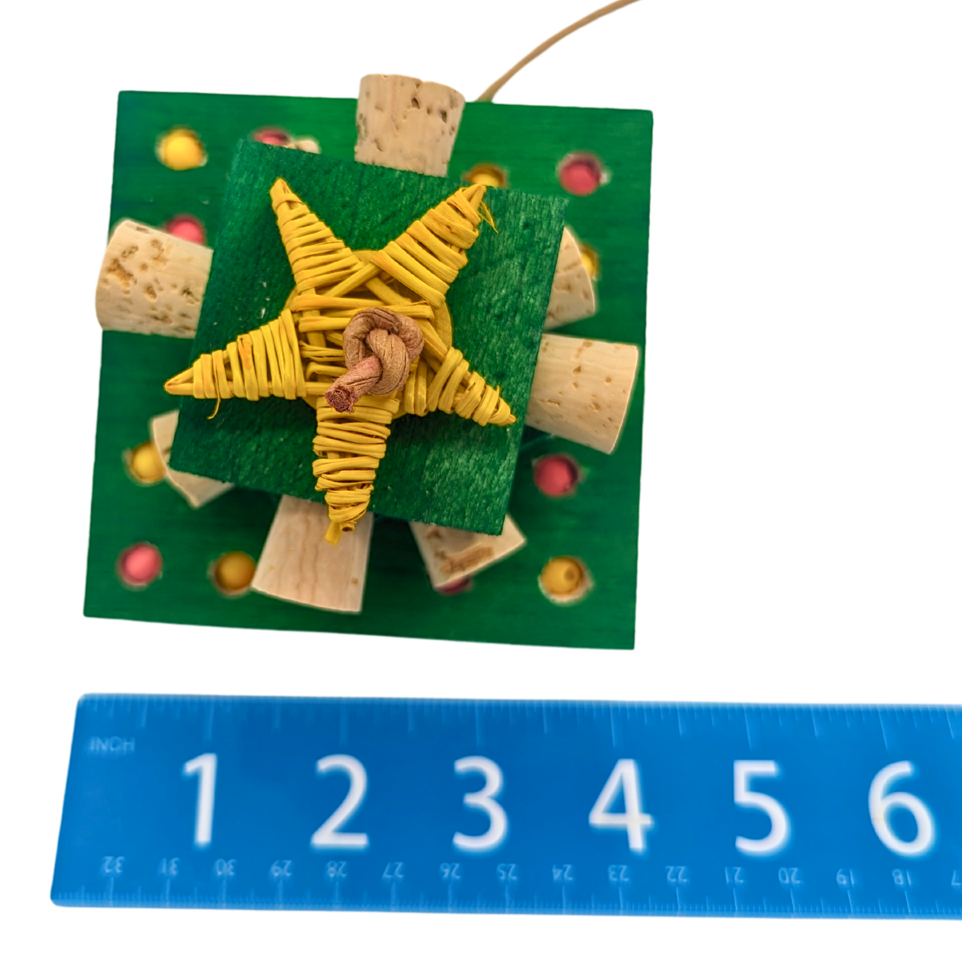 Spruced Up Christmas themed bird toy by Lil Monsters Bird Toys, top down view next to ruler for scale