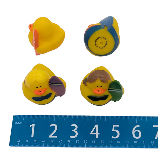 Surfer Themed Rubber Duck Parrot Toy Part by Lil Monsters Bird Toys, four next to ruler for scale and differences